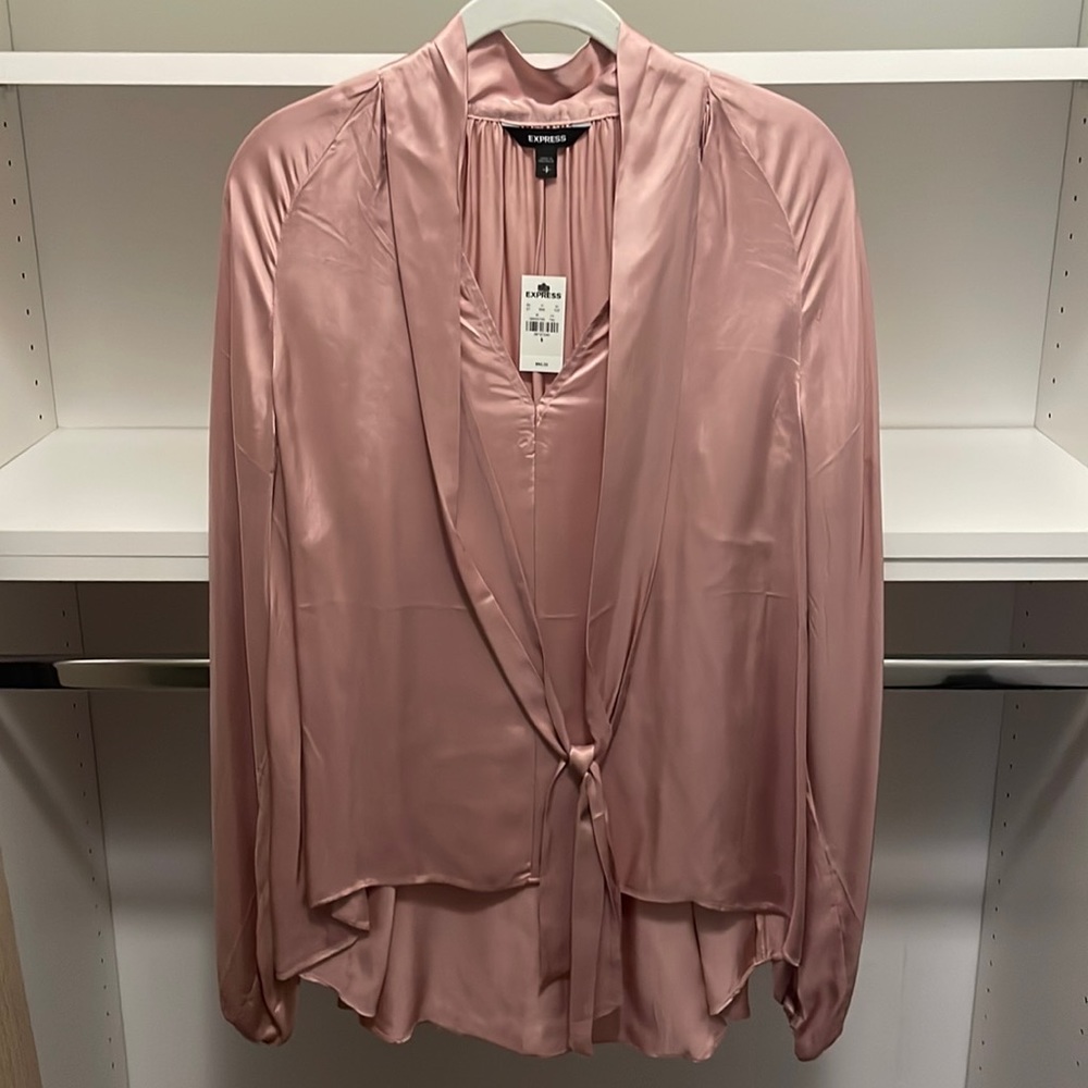 Express long sleeve 100% rayon women’s top.